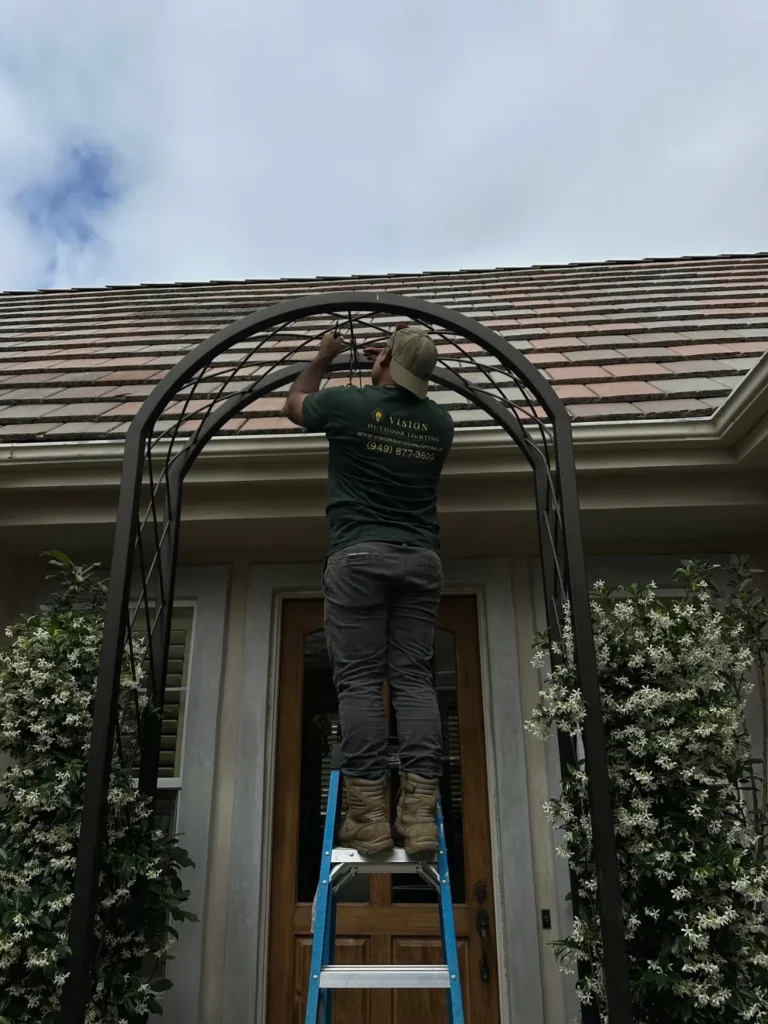 Outdoor lighting entrance installation in progress