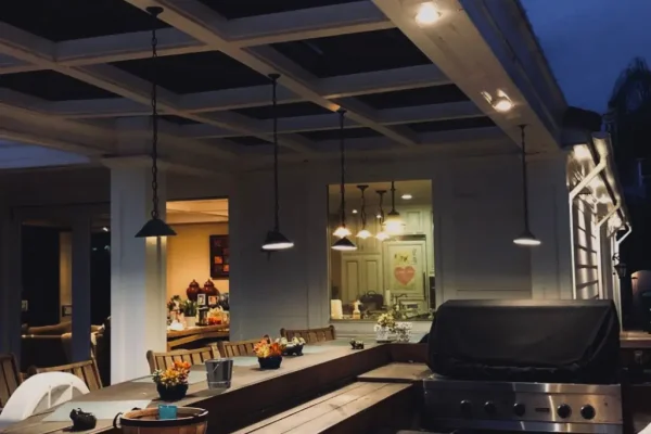 Covered patio with recessed soffit lighting and pendant lights