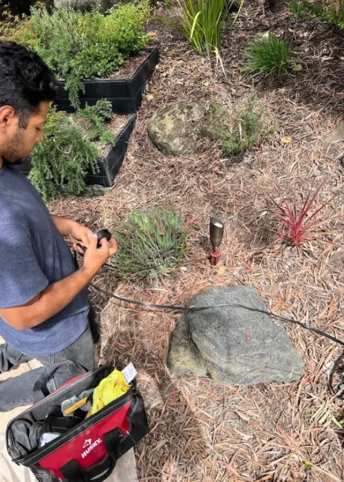 lighting setup with Vision Outdoor Lighting crew