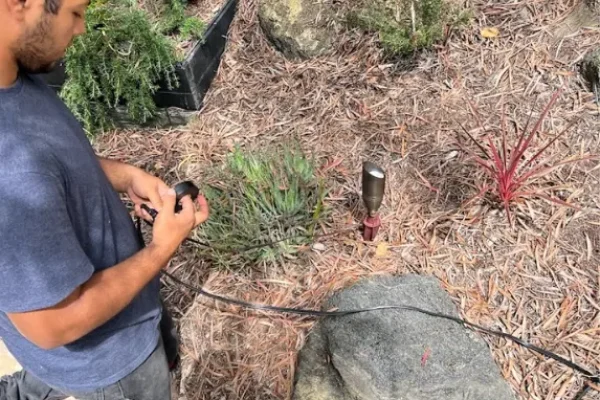 landscape lighting repairs and lighting setup with Vision Outdoor Lighting crew